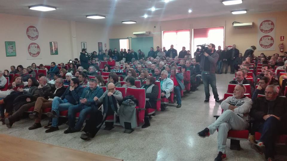 Delegados y delegadas en la asamblea